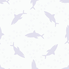 The pattern of silhouettes of sharks.