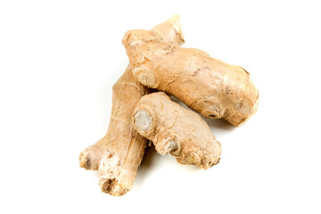 Whole ginger root isolated on a white background