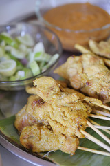 pork meat satay, asian bbq with peanut dip sauce