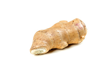 Whole ginger root isolated on a white background