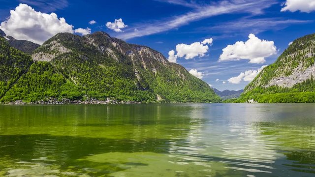 Mountain Lake in Hallstatt on a sunny day in summer, 4k timelapse
