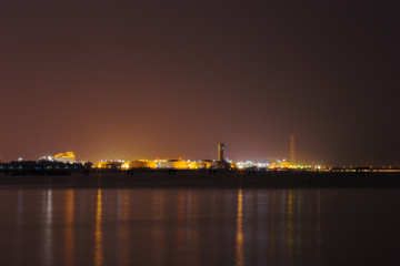 electrical power plant near sea coat at night, Rayong, Thailand