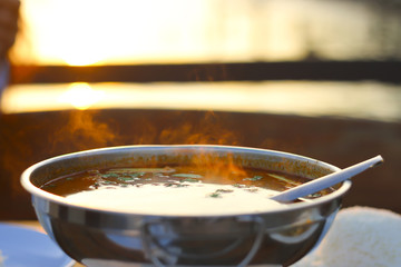 Stock Photo:.Cooking in sunset rays