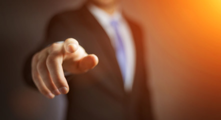 Businessman pointing his finger
