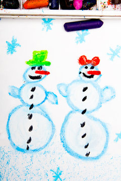 colorful drawing: Happy snowman couple