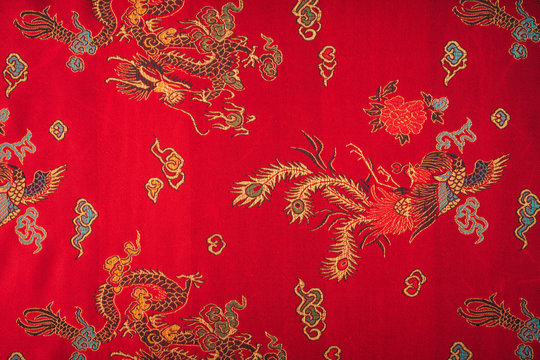Closeup of a red silky chinese fabric  ( Filtered image processe