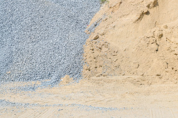 Closeup surface pile of sand and stone for construction work with ground textured background