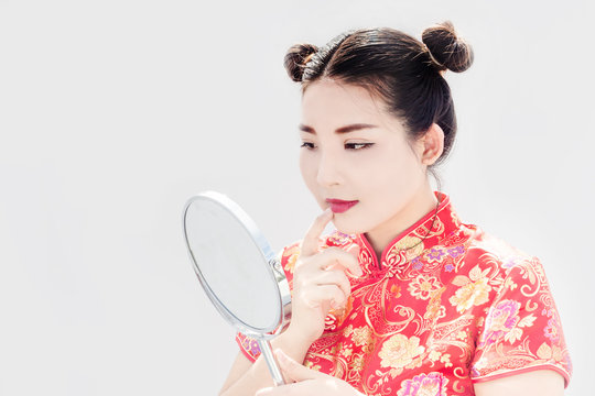 asian woman touch lip on white background