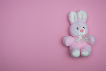 soft toy plush pink Bunny on a pink background