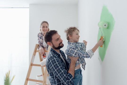 Family painting a room together