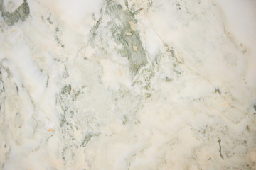 Lightened slices marble onyx. Horizontal image. Warm green colors. Beautiful close up background