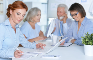Fototapeta premium Businesspeople Working In Office