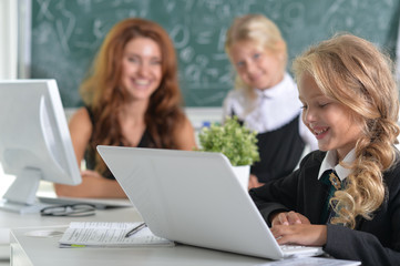 teacher with two girls 