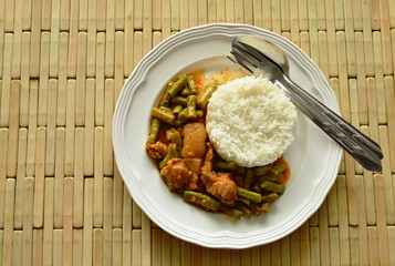 spicy stir fried fat pork and yard long bean curry eat couple with rice