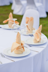 Fototapeta na wymiar Table set for wedding or event party. Elegant and luxury decorat