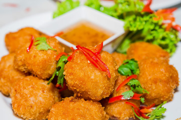 Thai Food Fried Shrimp Cake (Tod Mun Kung) on white plate