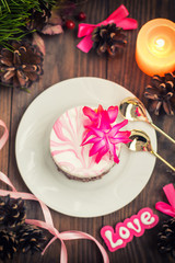 Cherry sponge cake with cream and red currant. Wooden background. Top view. Close-up