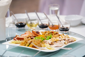 appetizer while have big meal  on white plate