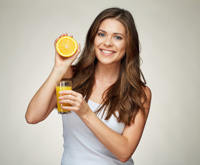 tothy smiling girl portrait with orange juice and fruit.