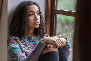 Sad Depressed Mixed Race African American Teenager Woman - 132683520