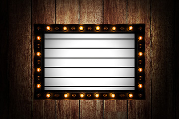 Vintage message board with light box and light bulb