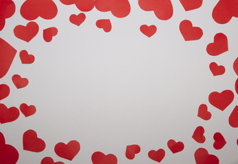 Frame from paper red hearts with white background