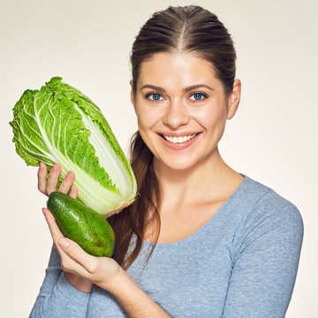 Green diet with healthy food and beautiful smiling woman.
