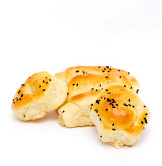 Fresh homemade rolled bakery on white background