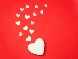 celebration of Valentine's Day card, red background with decor, love and relationships, family. View from above