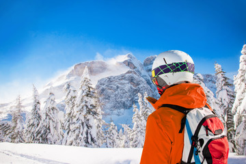 Fototapeta na wymiar Portrait of skier in high mountains