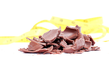 Chocolate pieces on white background
