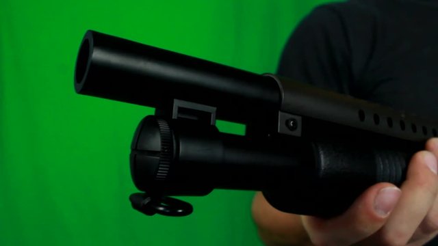Shooting And Reloading A Shotgun Twice Man Torse View