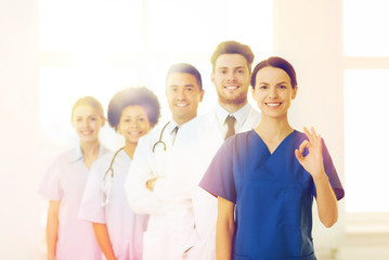 group of happy doctors at hospital