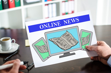 Online news concept on a paper