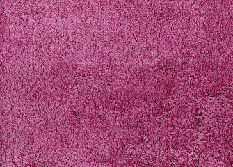 Pink color textile towel texture.