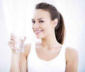 Young Woman With a Glass of Water