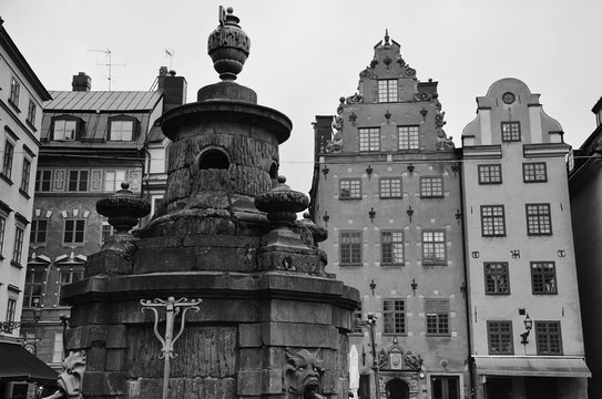Statue with water outlets at Stortorget, Stockholm, Sweden