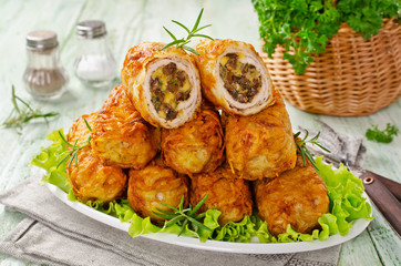 Crisp potato cutlets with meat, mushrooms and cheese