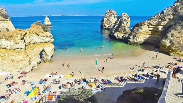 Beautiful beach Praia do Camilo, Lagos city, Algarve region, Portugal. Time Lapse