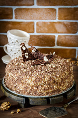 Honey cake with walnuts and grated chocolate