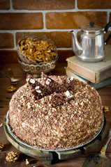 Honey cake with walnuts and grated chocolate