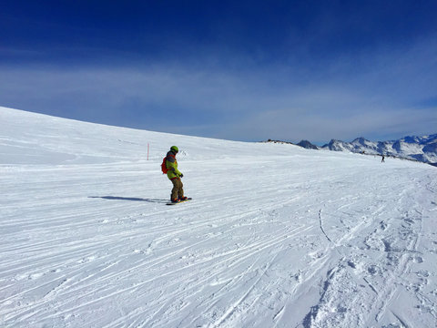 Mountain day winter. Elbrus. Snowboard.