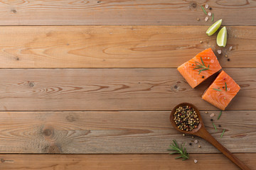 Beautiful composition of fresh salmon fillet with rosemary, salt