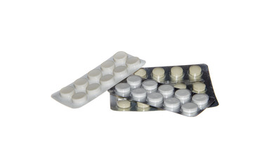 Blister packs of pills isolated on the white background, three package of pills. Close