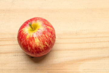 apples red on wood background