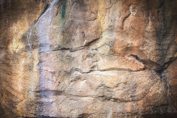 texture and abstract background a large rock wall. decorate the park.