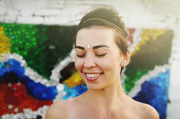 Smiling girl portrait in sunlight with closed eyes © olenalyzun