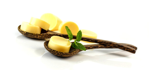 Egg tofu on wooden spoon