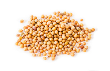 Heap of mustard seeds isolated.