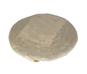Background. Raw sheng (shu) puerh tea cake wrapped in paper